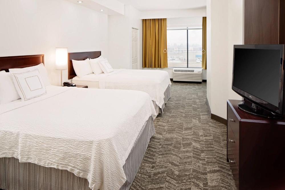 Queen Suite with Two Queen Beds and Sofa Bed interior